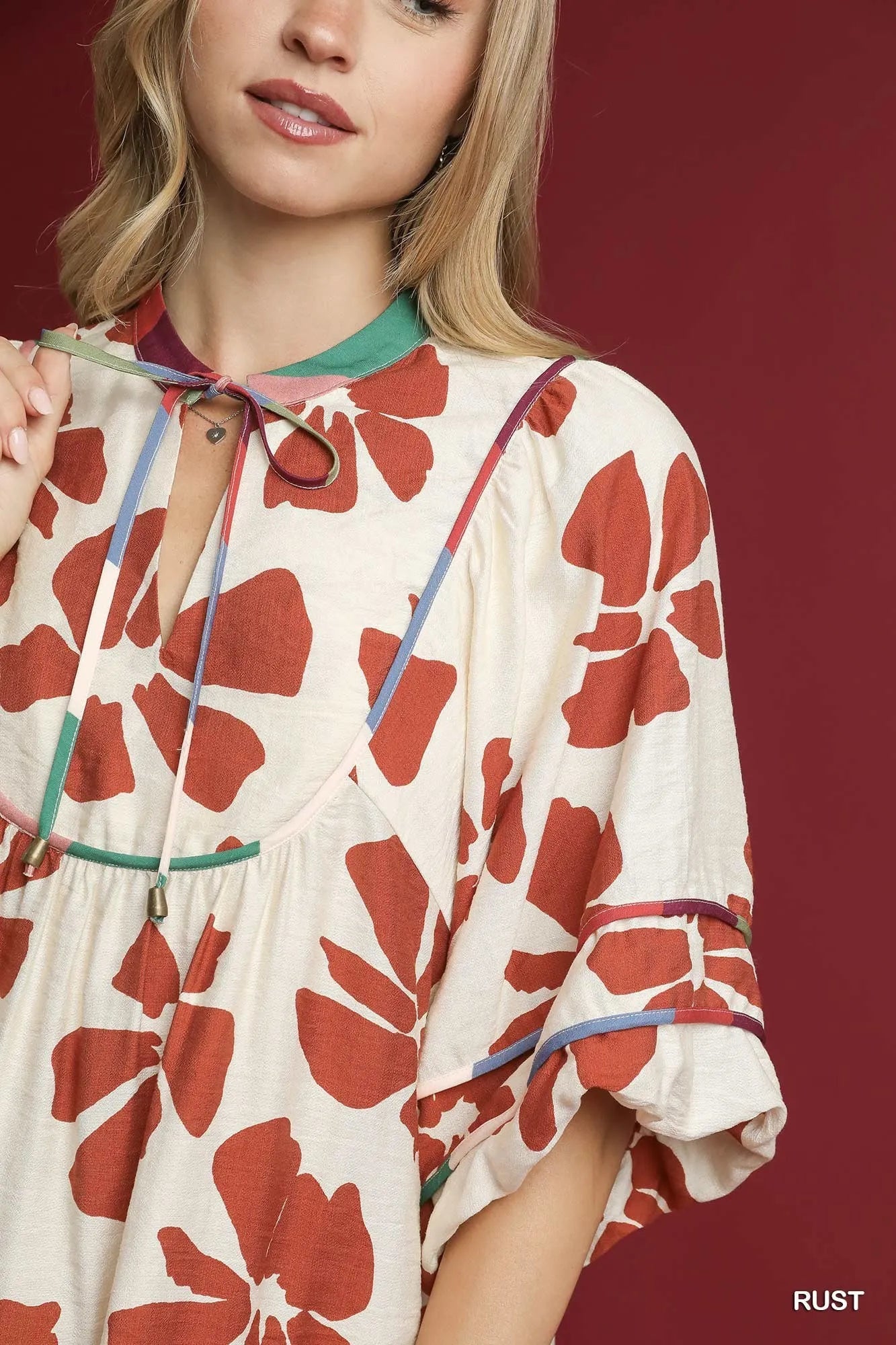 Image of Umgee Two Tone Floral Tie-Neck Babydoll Dress | Queeble.shop