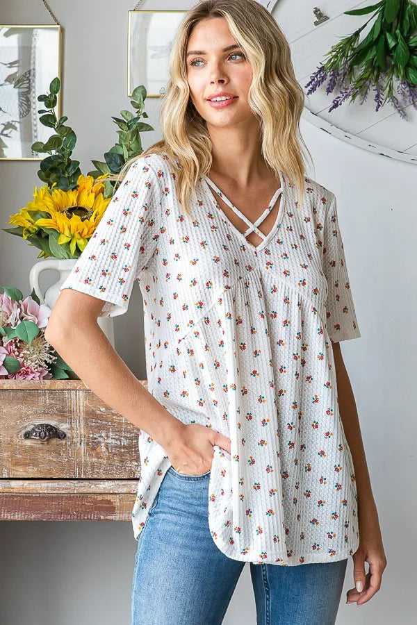 Image of Heimish Full Size Crisscross Ditsy Floral Babydoll Top Plus Size | Queeble.shop