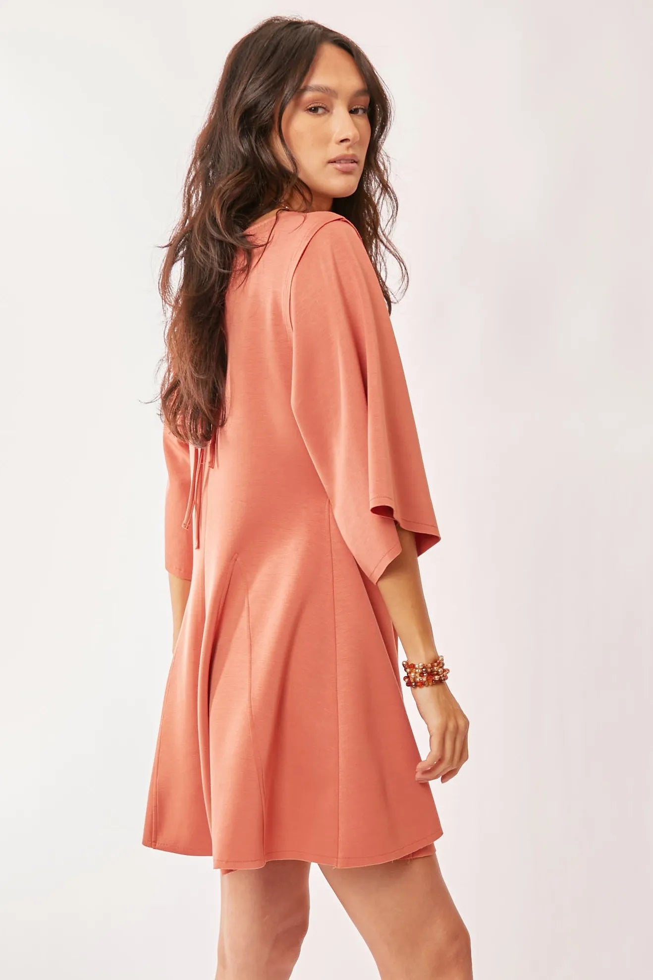 Image of Davi & Dani Solid Draped Sleeve Ties Back Skort Romper | Queeble.shop