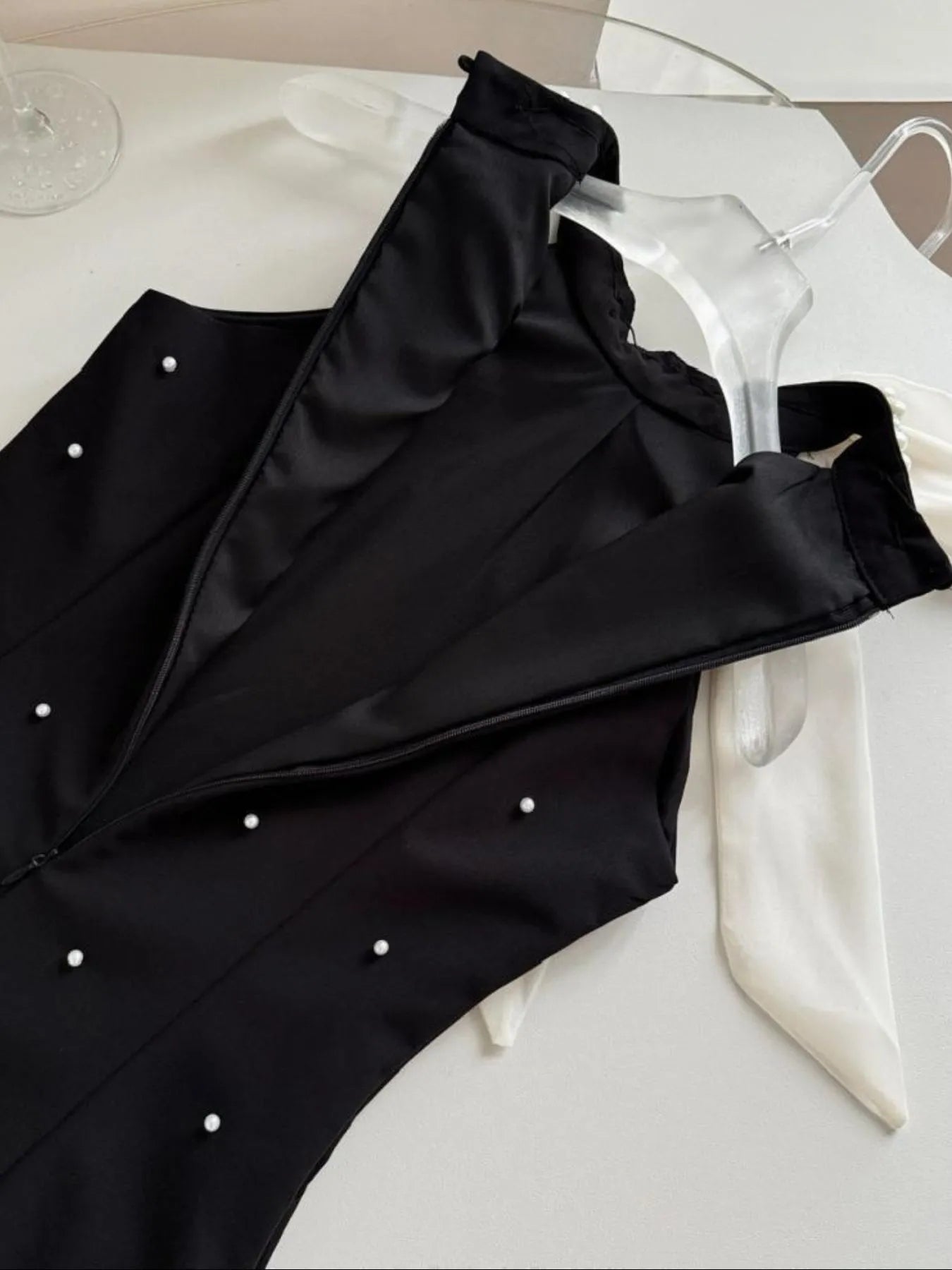 Image of Pearl Detail Sleeveless Mini Dress | Queeble.shop