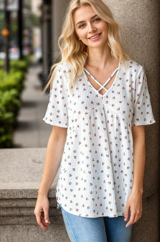 Image of Heimish Full Size Crisscross Ditsy Floral Babydoll Top Plus Size | Queeble.shop