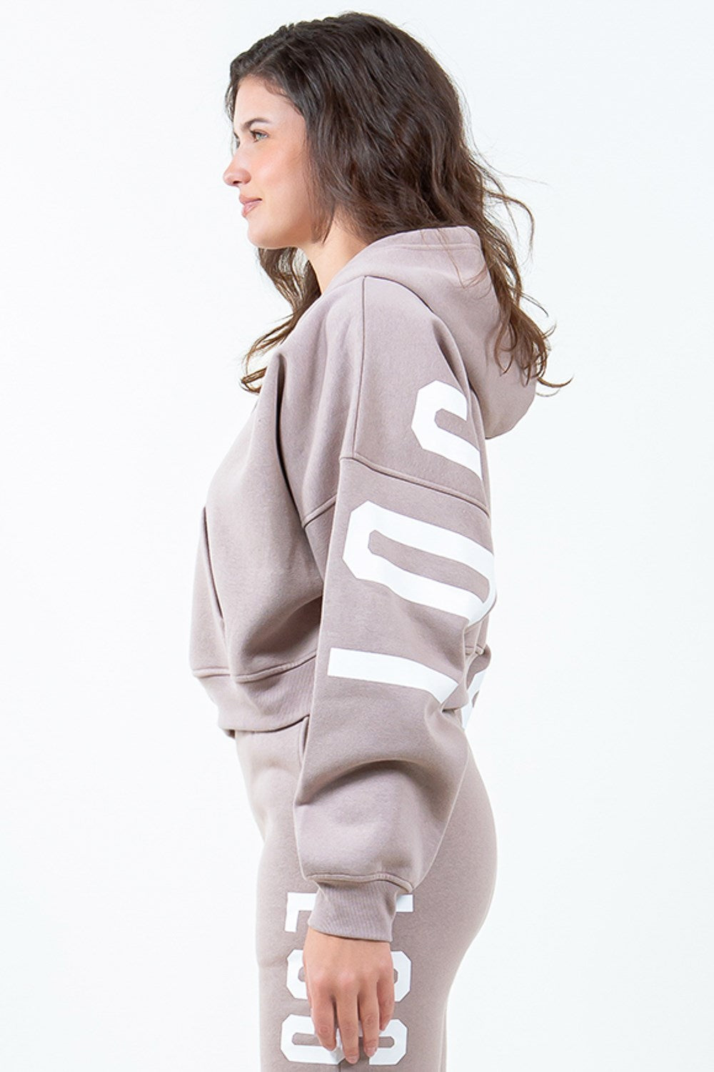 Image of American Bazi Letter Graphic Long Sleeve Drawstring Cropped Hoodie | Queeble.shop