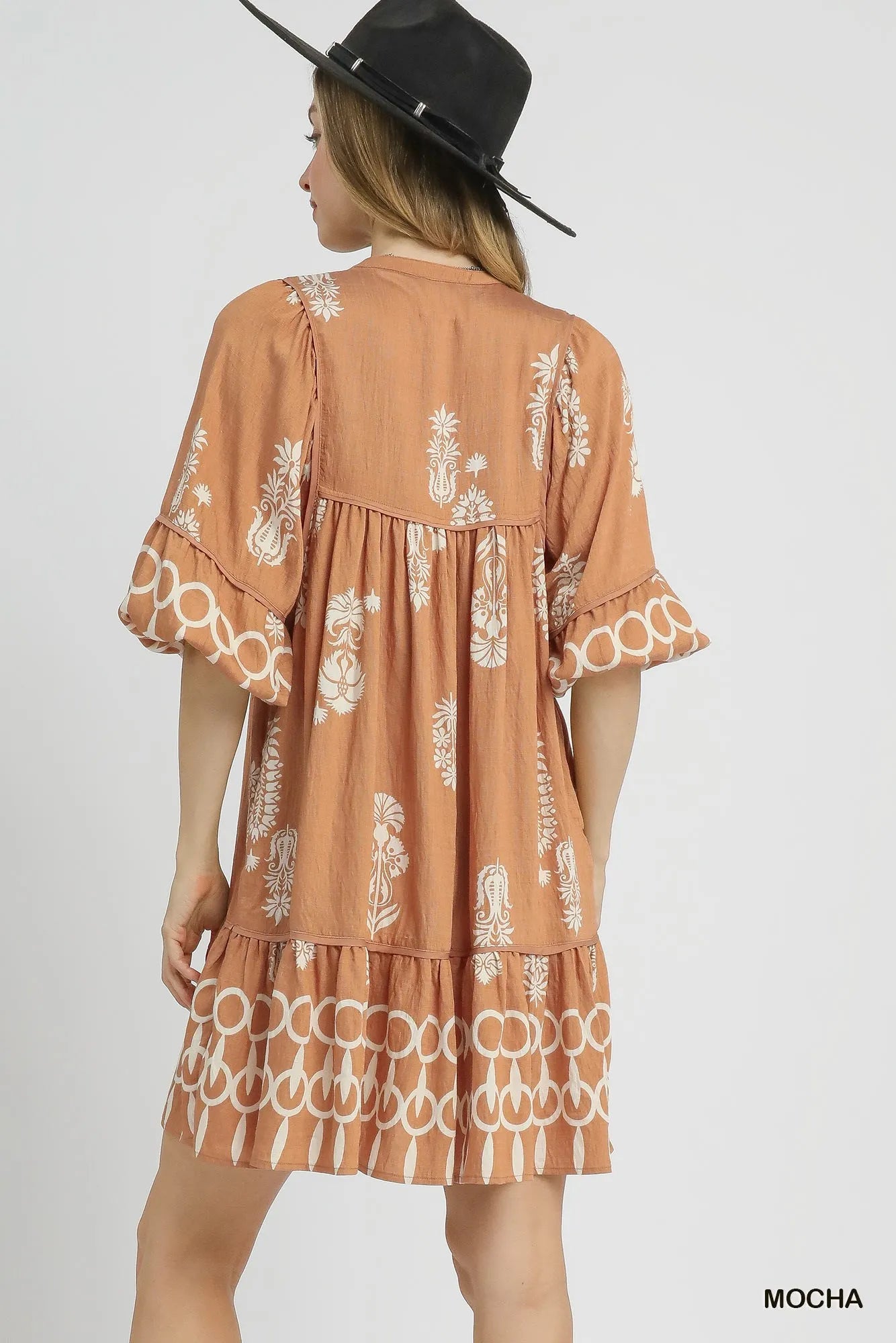 Image of Umgee Boarder Print Tassel Tie Neck Mini Dress | Queeble.shop