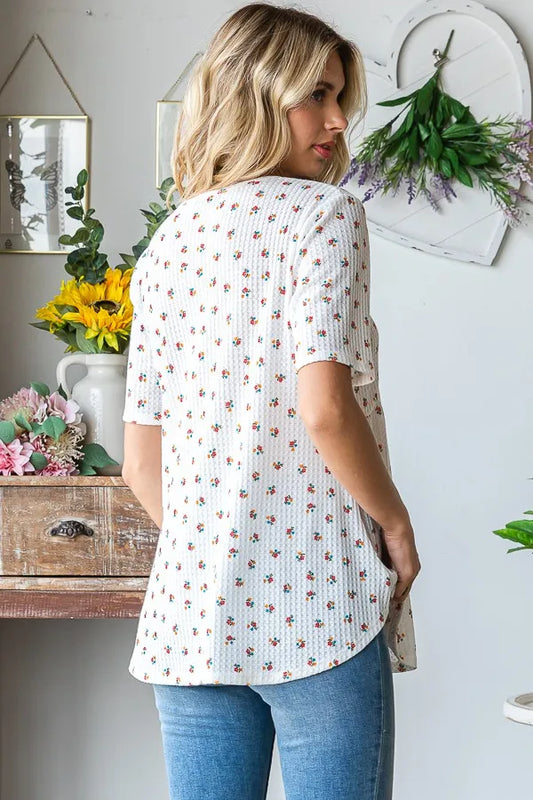 Image of Heimish Full Size Crisscross Ditsy Floral Babydoll Top Plus Size | Queeble.shop