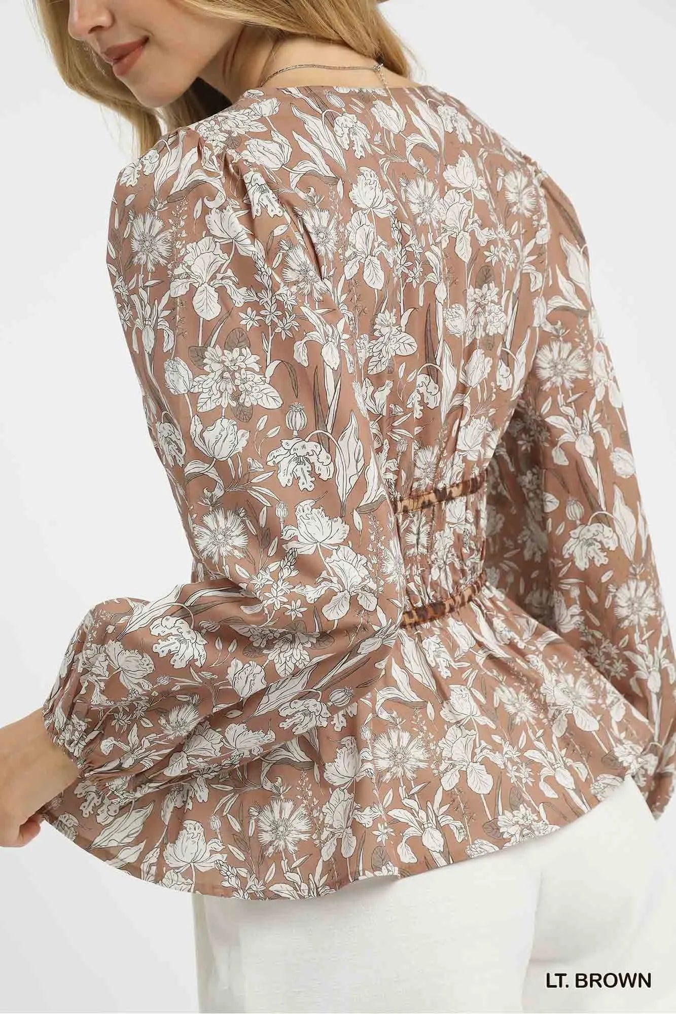 Image of Umgee Floral Smocked Peplum Blouse with Tie Detail | Queeble.shop