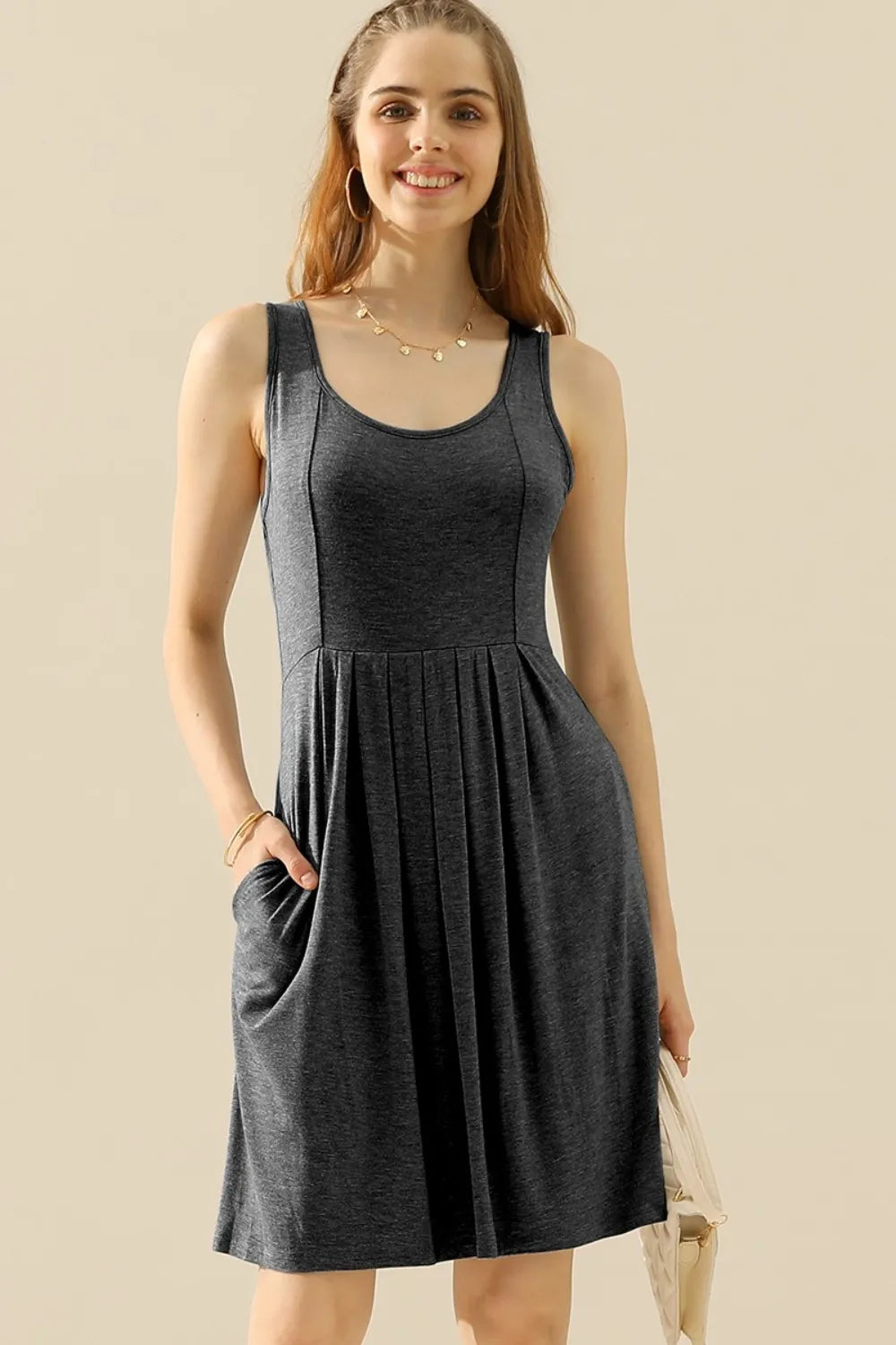 Image of Doublju Full Size Round Neck Ruched Sleeveless Dress with Pockets | Queeble.shop