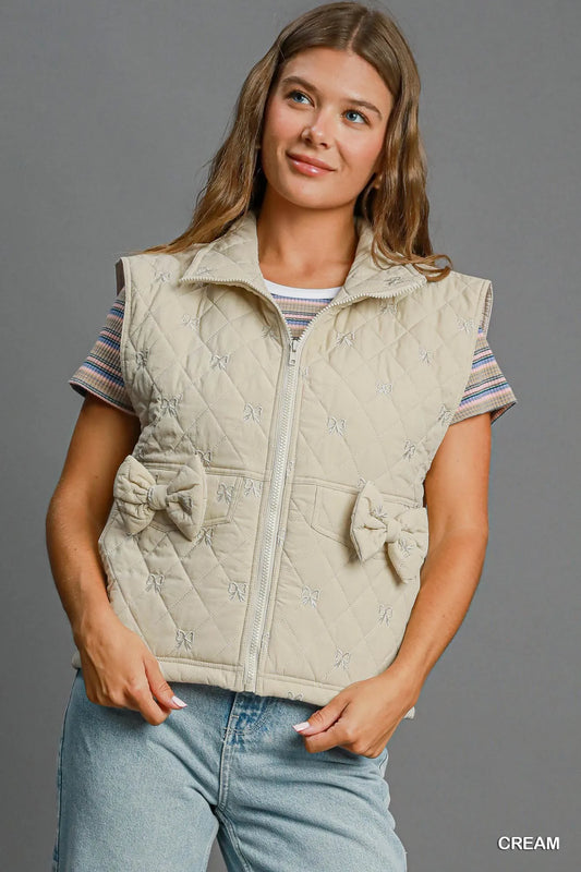 Image of Umgee Sleeveless Quilted Vest with Bow Details | Queeble.shop