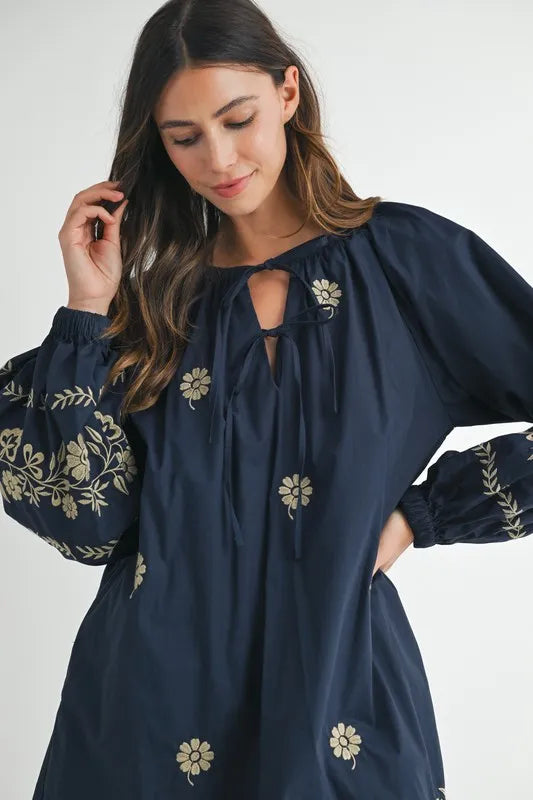 Image of MABLE Embroidered Long Sleeve Peasant Mini Dress | Queeble.shop