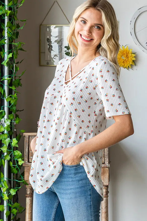 Image of Heimish Full Size Crisscross Ditsy Floral Babydoll Top Plus Size | Queeble.shop