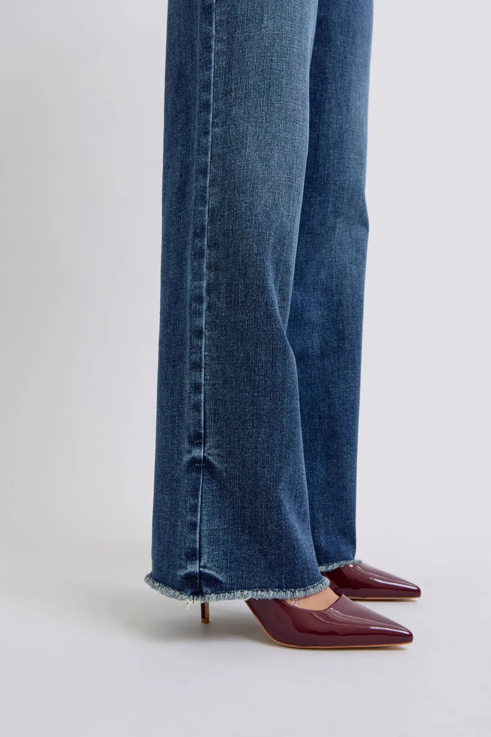 Image of Judy Blue Full Size Raw Hem Mid Rise Jeans | Queeble.shop